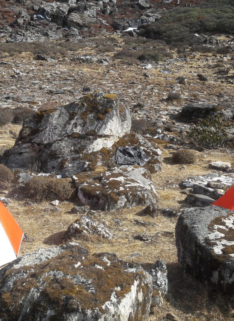 High ridge trail marked with painted stones