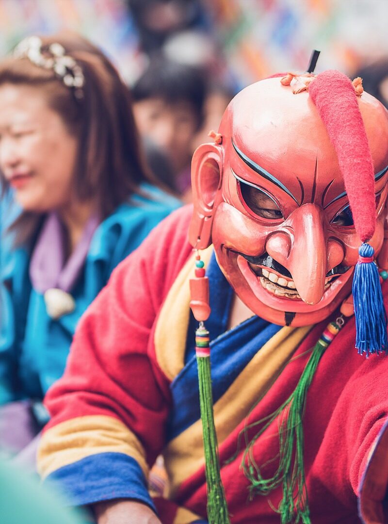 Masked sacred Cham dancers at Bhutanese festival